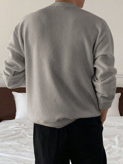 Pull homme col rond tricot côtelé coupe ample