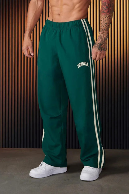 Jogging homme coupe athlétique bandes latérales