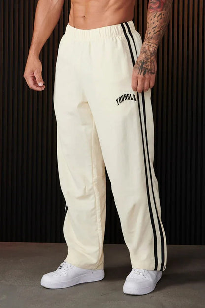 Jogging homme coupe athlétique bandes latérales